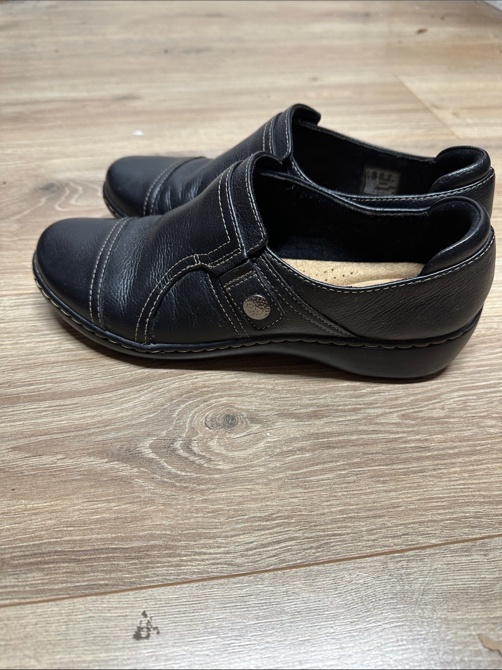 Clarks Black Leather Women's Slip-On Loafers with Button Accent